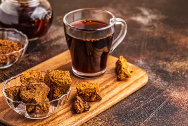 chaga tea on top of a chopping board