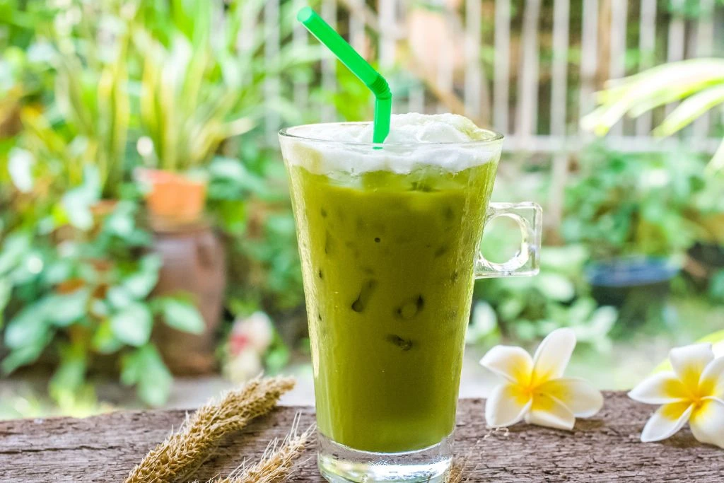 Avocado Milk tea on a wood