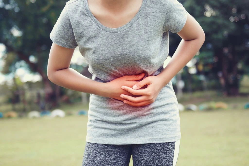 young woman having stomachache