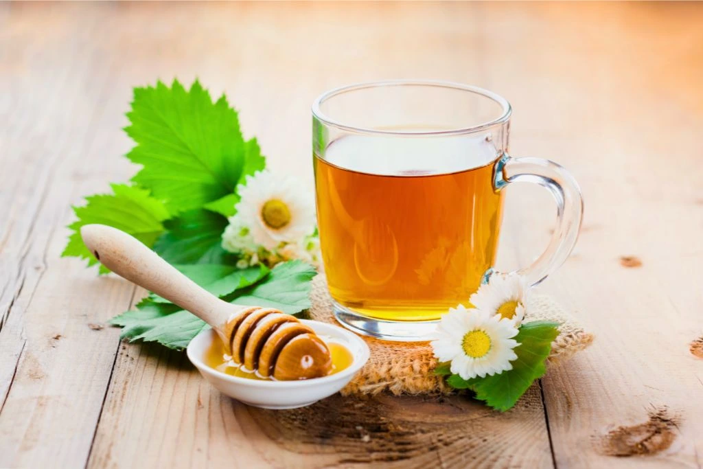 Green Tea and Honey prepared on a glass cup