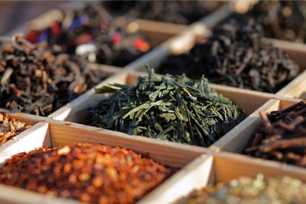 several types of sencha tea prepared neatly