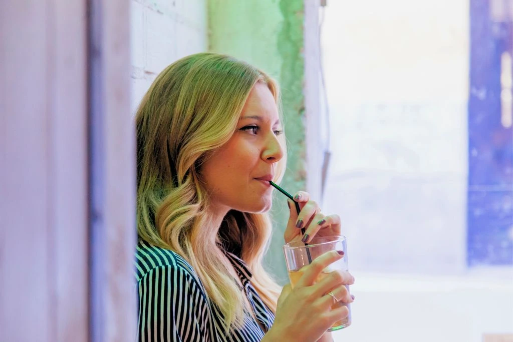 woman drinking tea beverage