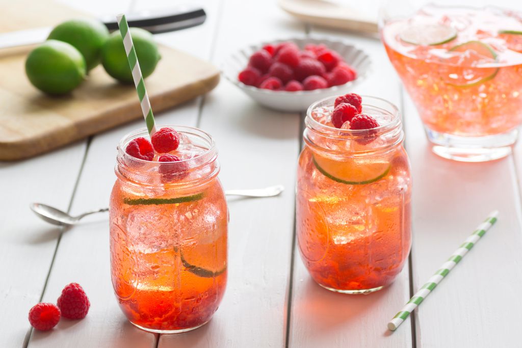 raspberry iced tea in two glasses and straws