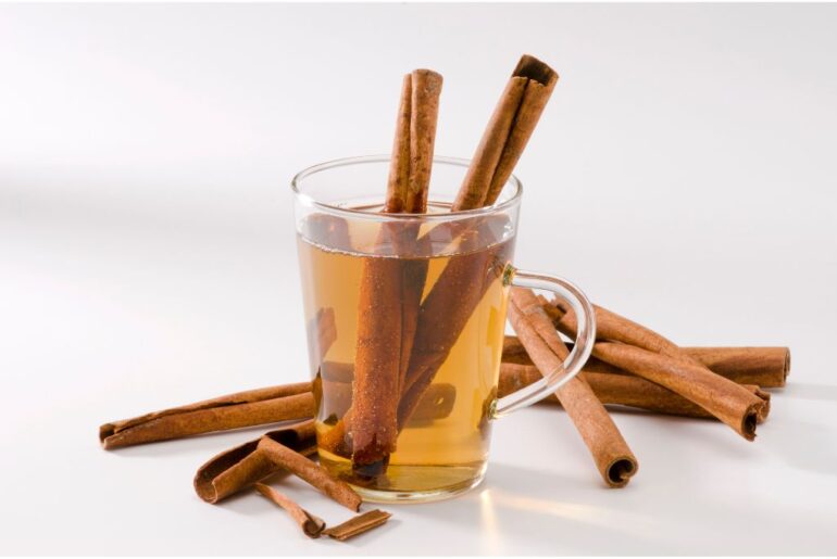 Cinnamon herbal tea in a transparent mug