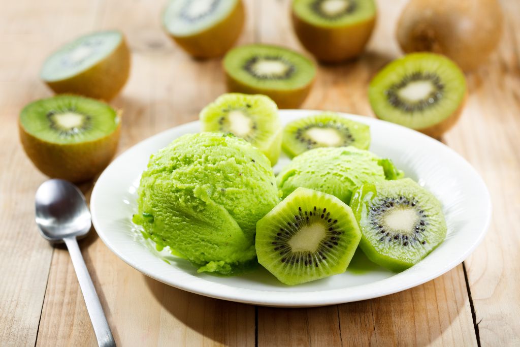 kiwi fruit on white plate