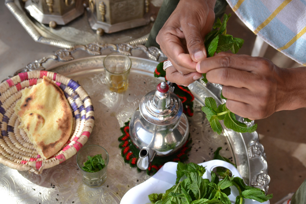 preparing a moroccan mint tea