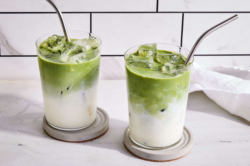 iced Matcha Tea with milk placed on coaster