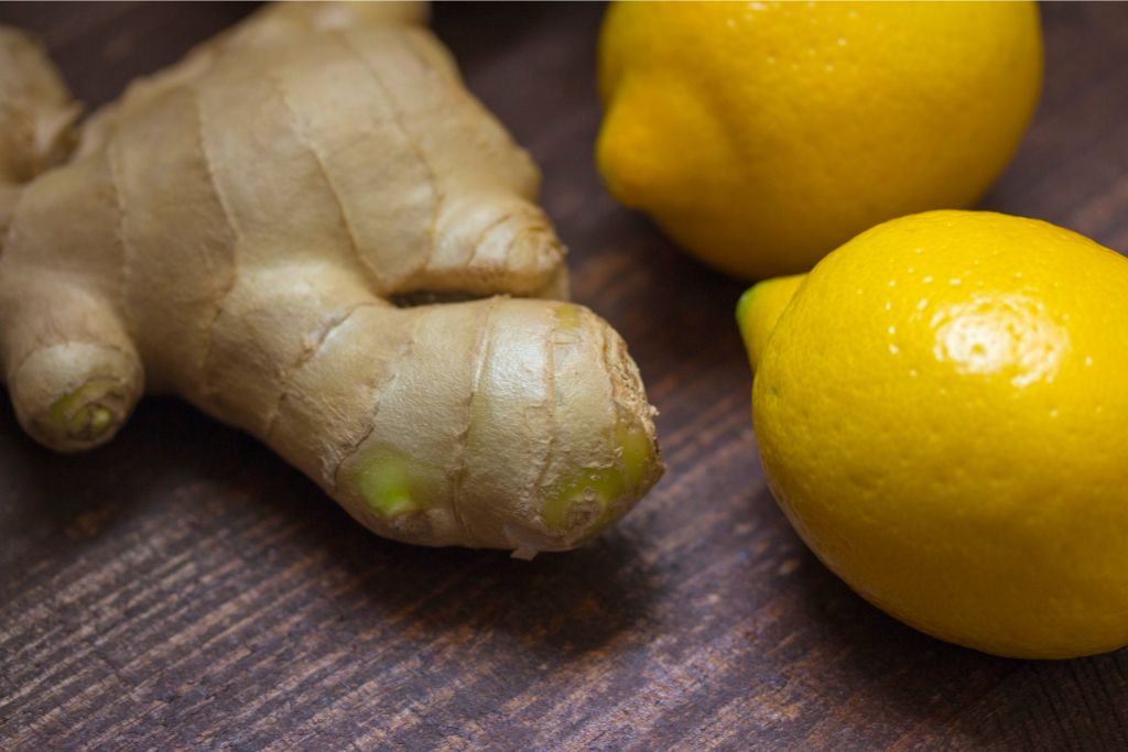 lemon and ginger on a wood background