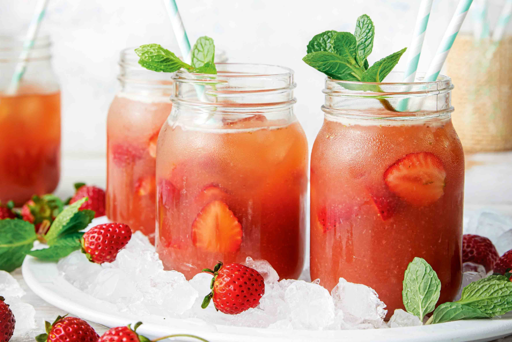 iced strawberry mint tea with sliced strawberries 