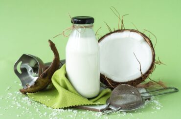 Coconut milk as a major ingredient of coconut chai tea in a glass bottle