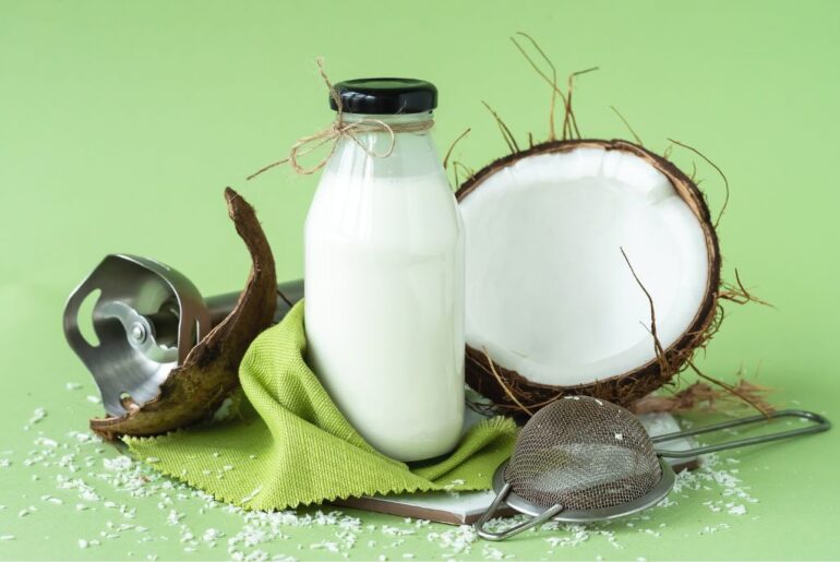 Coconut milk as a major ingredient of coconut chai tea in a glass bottle