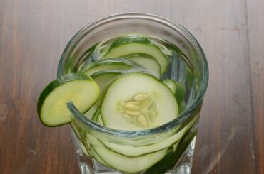 sliced cucumber on a glass